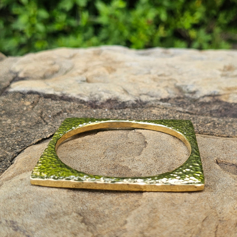 An image of gold-color Minimal square brass bangle with crisp edges. Shop Kamawe