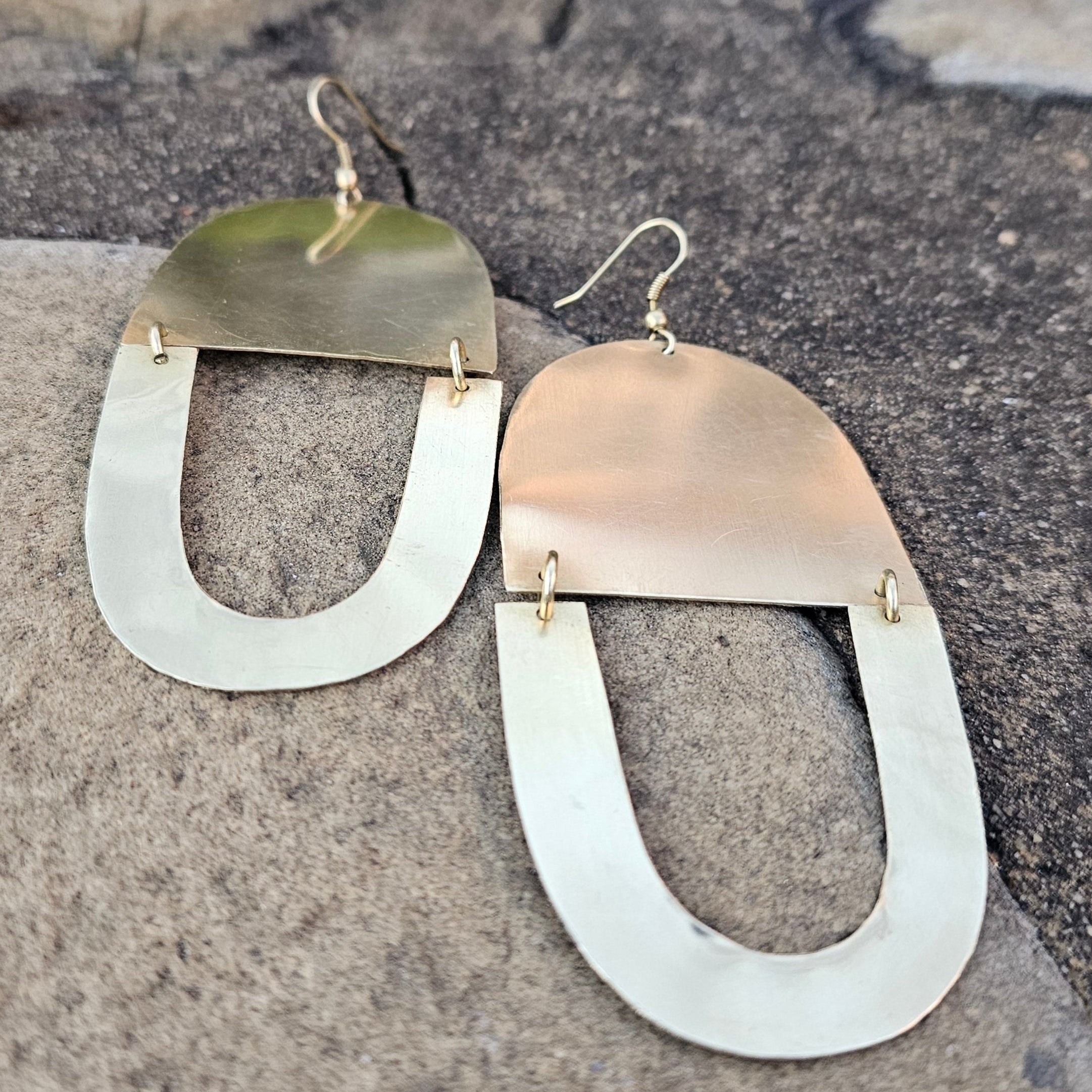 An image of gold-color Minimal double-U brass earrings with clean curves. Shop Kamawe