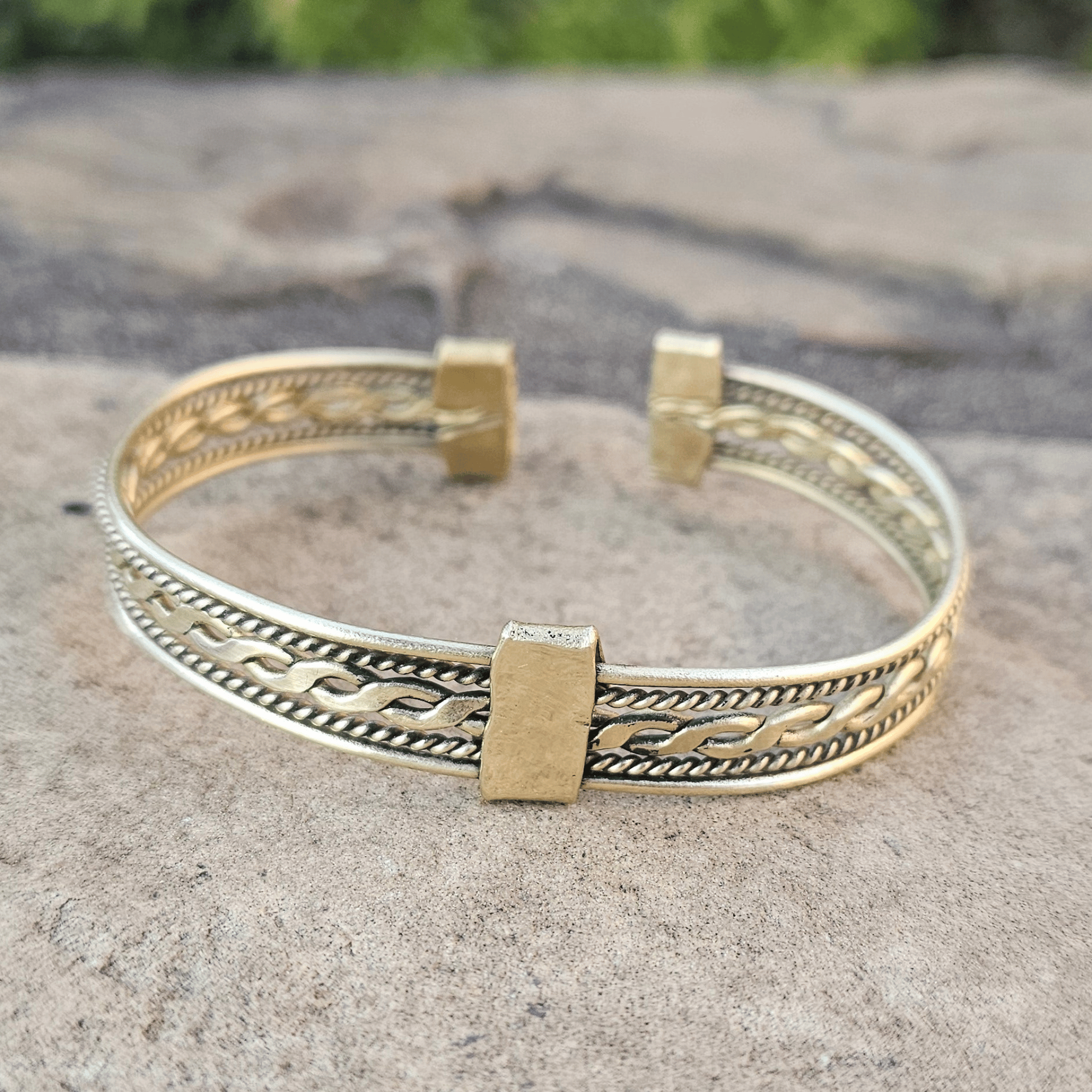 An image of gold-color Textured twisted brass bracelet with a bold, everyday unisex fit. Shop Kamawe