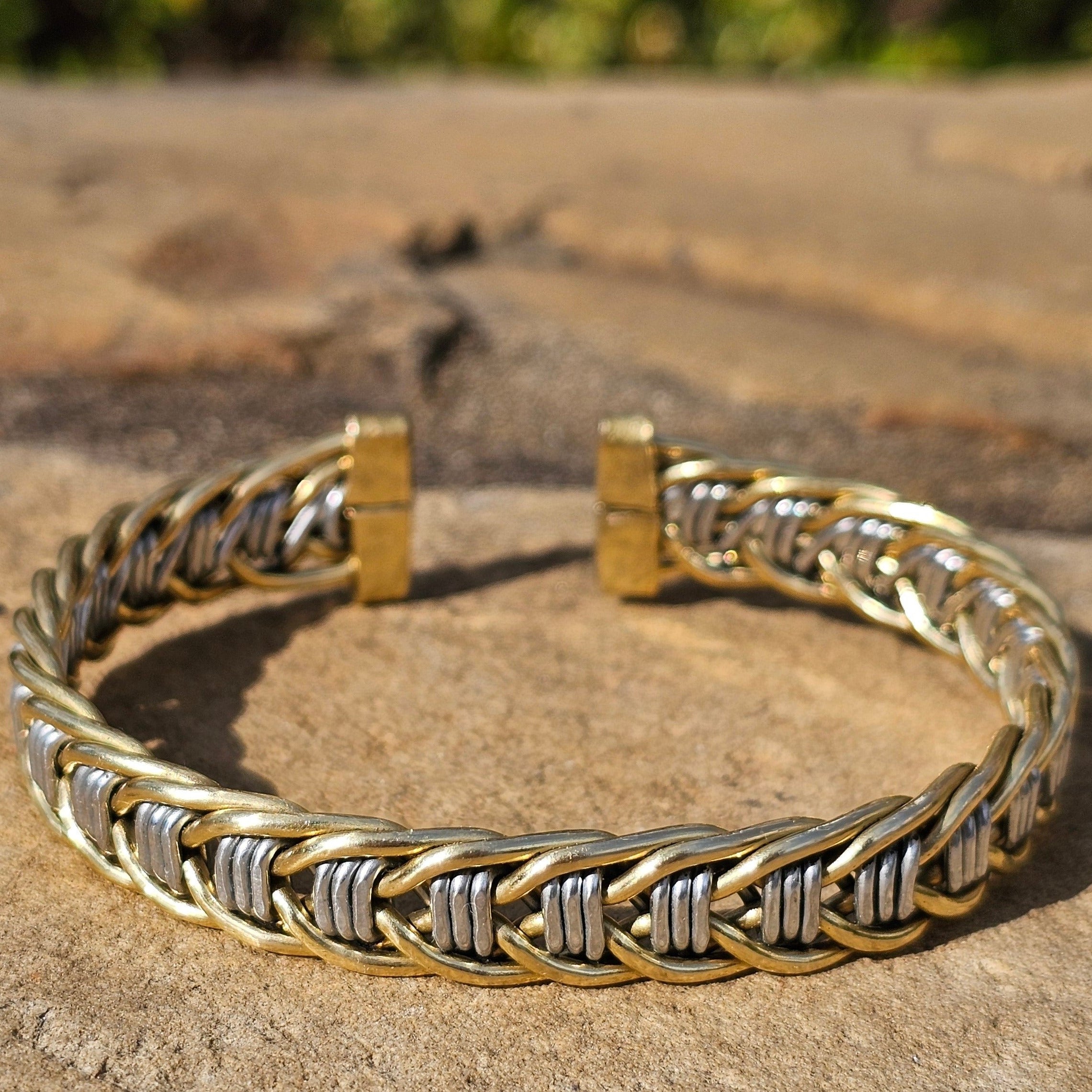 An image of silver-color Contrasting metals woven into one bracelet. Shop Kamawe