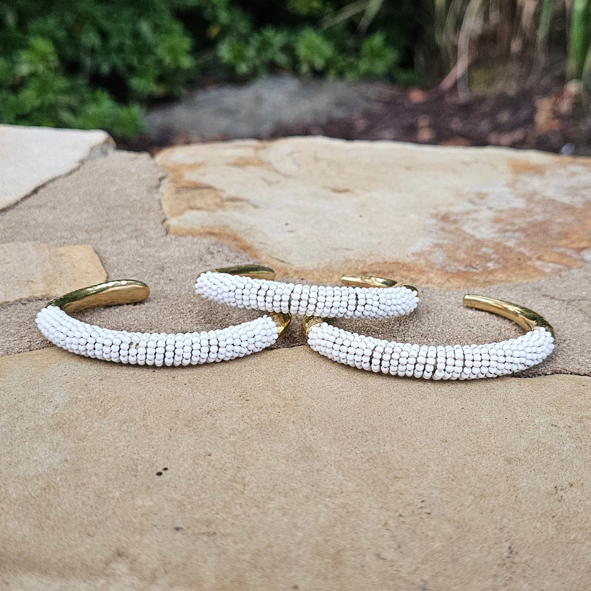 Hammered White Beaded Lion's Tooth Open Brass Bracelet